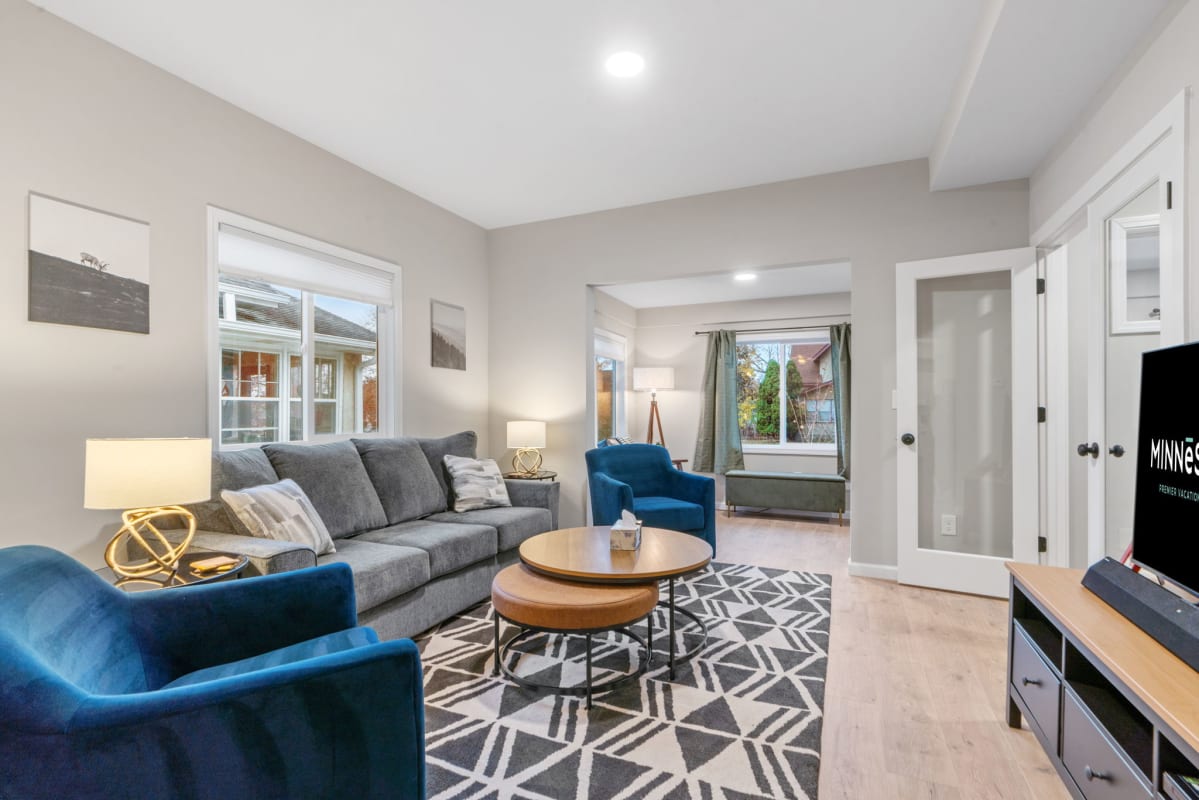 Sink into plush seating surrounded by warm lighting and thoughtful design touches that make this space feel like home.