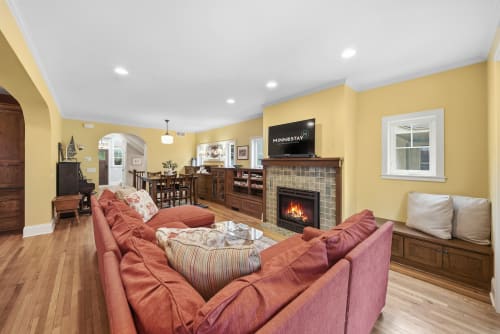 Picture yourself unwinding on plush seating as firelight warms the room, the perfect setting to reconnect with loved ones after a day exploring the area.