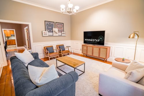 Sink into plush seating and enjoy movie nights on your large smart TV in this beautifully appointed living space.