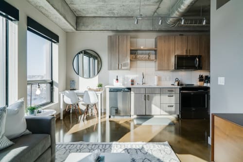 Your modern loft features sleek finishes, floor-to-ceiling windows, and an open layout perfect for city living.
