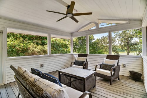 Relax in your private screened porch with comfy seating and peaceful garden views—perfect for morning coffee or evening unwinding.