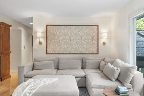 Sink into this plush sectional where soft textures and warm lighting create your perfect retreat for unwinding after exploring.