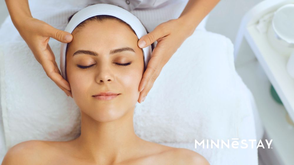 Woman getting a facial at one of the top tier spa picks by MINNeSTAY