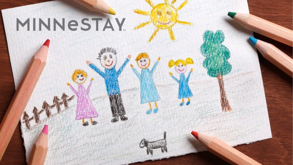 Family friendly amenities at a MINNeSTAY vacation rental shown with a kid coloring a family memory from the vacation.