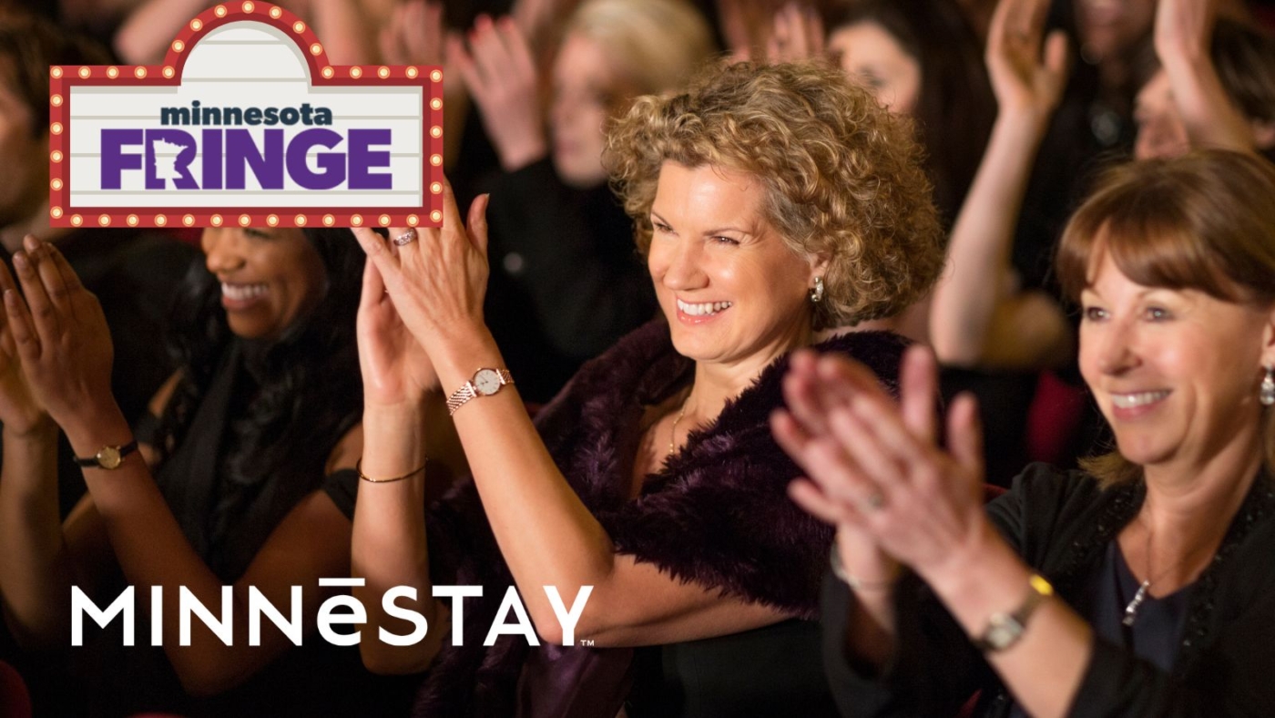 fringe Audience Members applauding a performance in the Fringe Festival