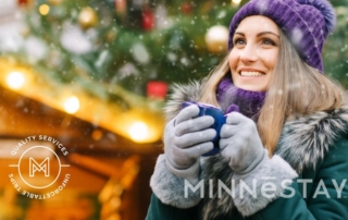 Person enjoying a warm drink at the Winter Carnival